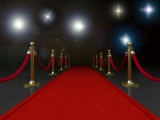 red carpet entrance camera flashes